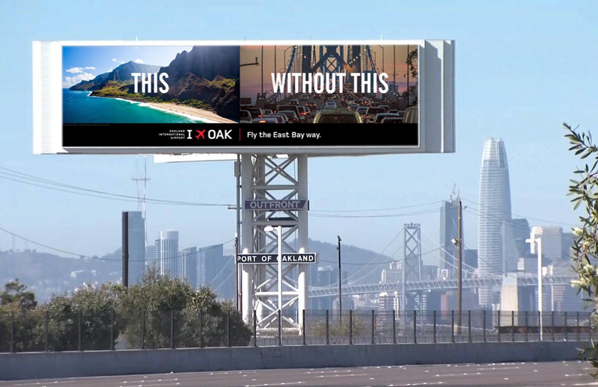 OAK billboard by the Bay Bridge reading This, over a Hawaii beach, Without this, over bridge traffic, with Fly the East Bay way